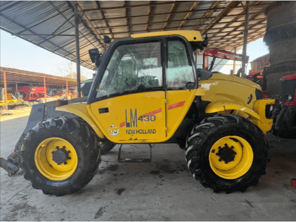Навантажувач New Holland LM 430 (2001)