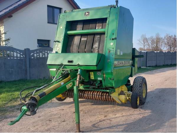 Прес-підбирач рулонний John Deere  580 (1995)