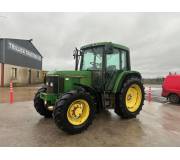 Трактор John Deere 6400