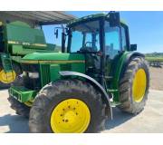 Трактор John Deere 6400