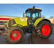 Трактор Claas Axion 810